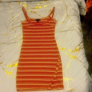 Orange white and brown dress. Size M.